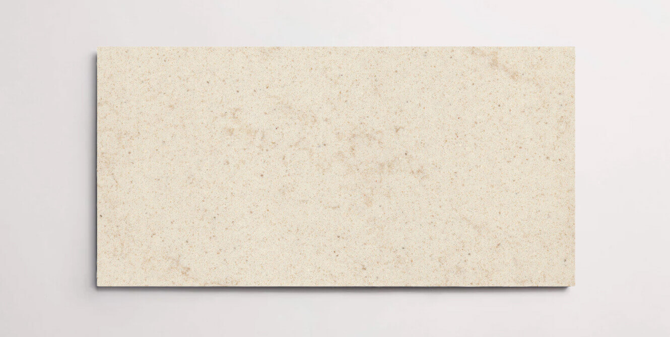A single sand colored terrazzo marble tile