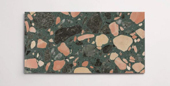 A single dark green terrazzo marble tile with various sized multicolor aggregates throughout