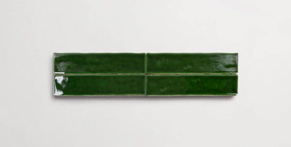 Four stacked 2" x 10" dark green ceramic tiles in a glossy finish