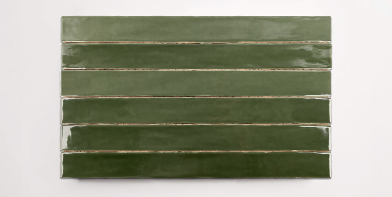 Six stacked 2" x 20" ceramic tiles in a dark green color