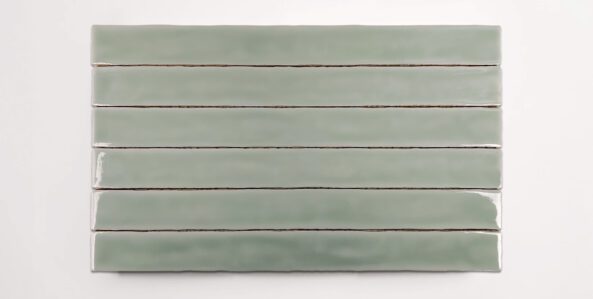 Six stacked 2" x 20" ceramic tiles in a light green color