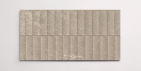 A single brown 10" x 30" porcelain tile resembling stone with a textured blind pattern and subtle veining