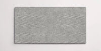 A single grey 10" x 30" porcelain tile resembling stone with a textured finish