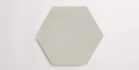 Nasco Stone + Tile Altitude White hexagon porcelain tile.