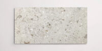 Nasco Stone + TIle's Bella Crema 24" x 48" limestone tile.