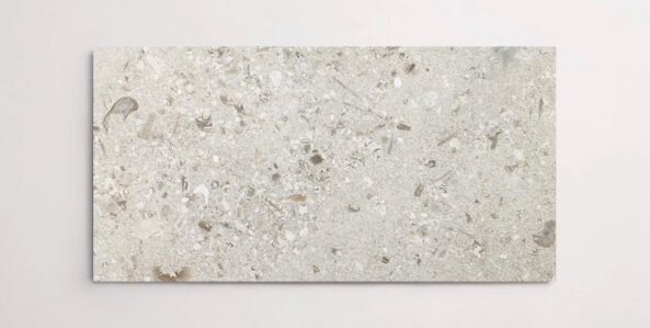 Nasco Stone + TIle's Bella Crema 24" x 48" limestone tile.