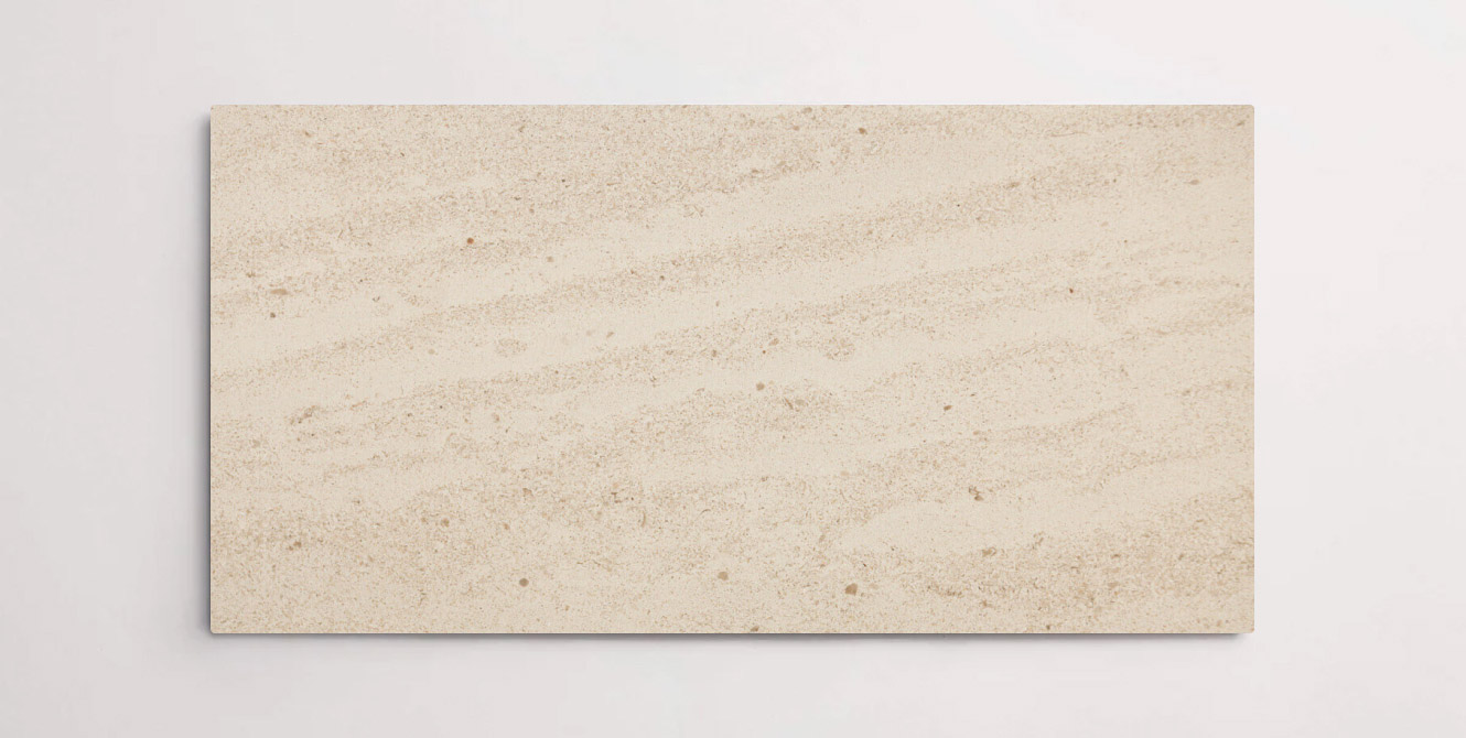 Nasco Stone + TIle's Crema Waves 24" x 48" limestone tile.