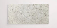 Nasco Stone + TIle's Azul Beauval White 24" x 48" limestone tile.