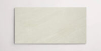 Nasco Stone + Tile Alto White 12" x 24" porcelain tile.