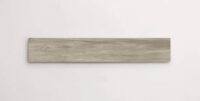 Nasco Stone + Tile Lift Light Grey 8" x 36" wood-look porcelain tile.