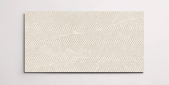 A single cream 10" x 30" porcelain tile resembling stone with a textured finish